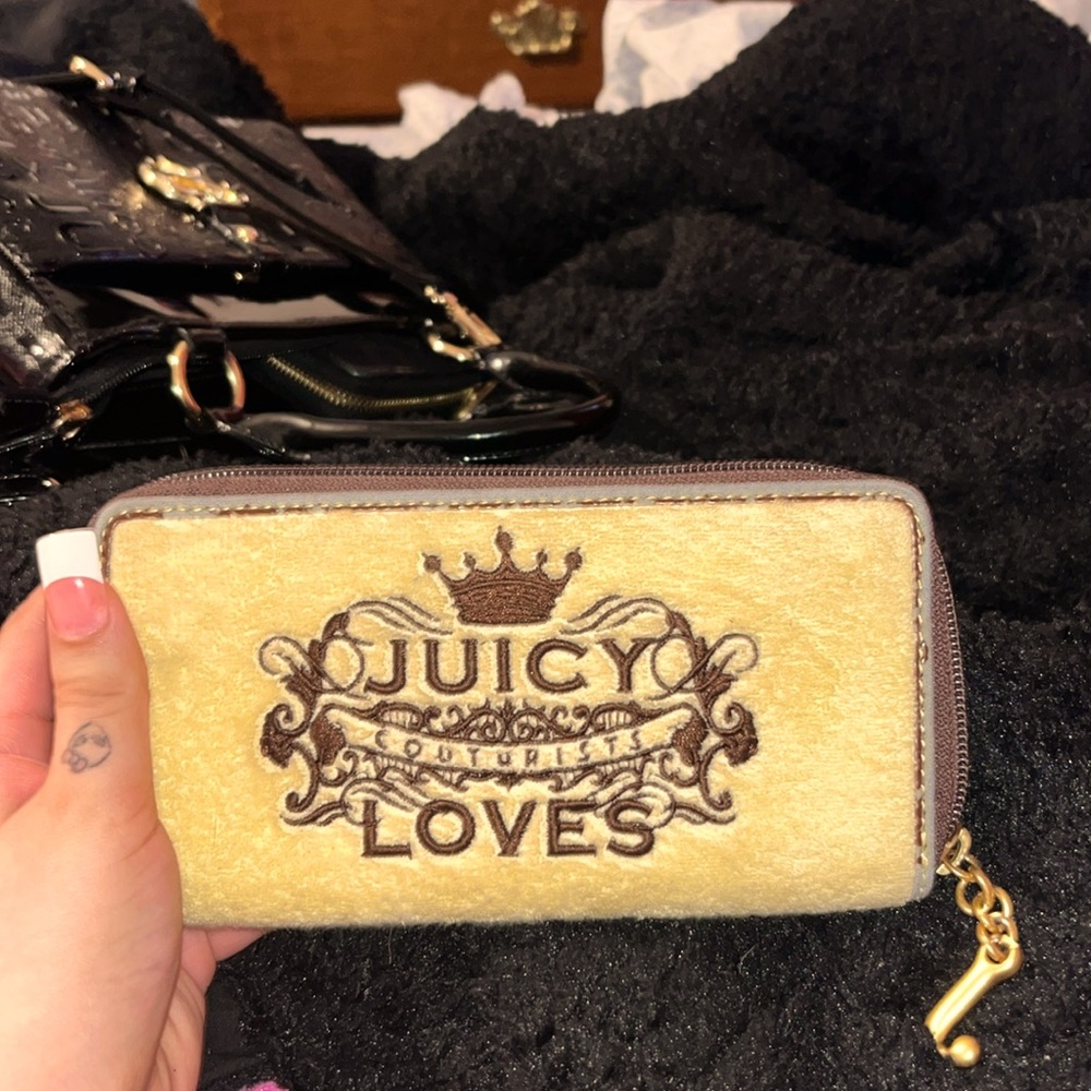 “ juicy couture loves” wallet by juicy couture.